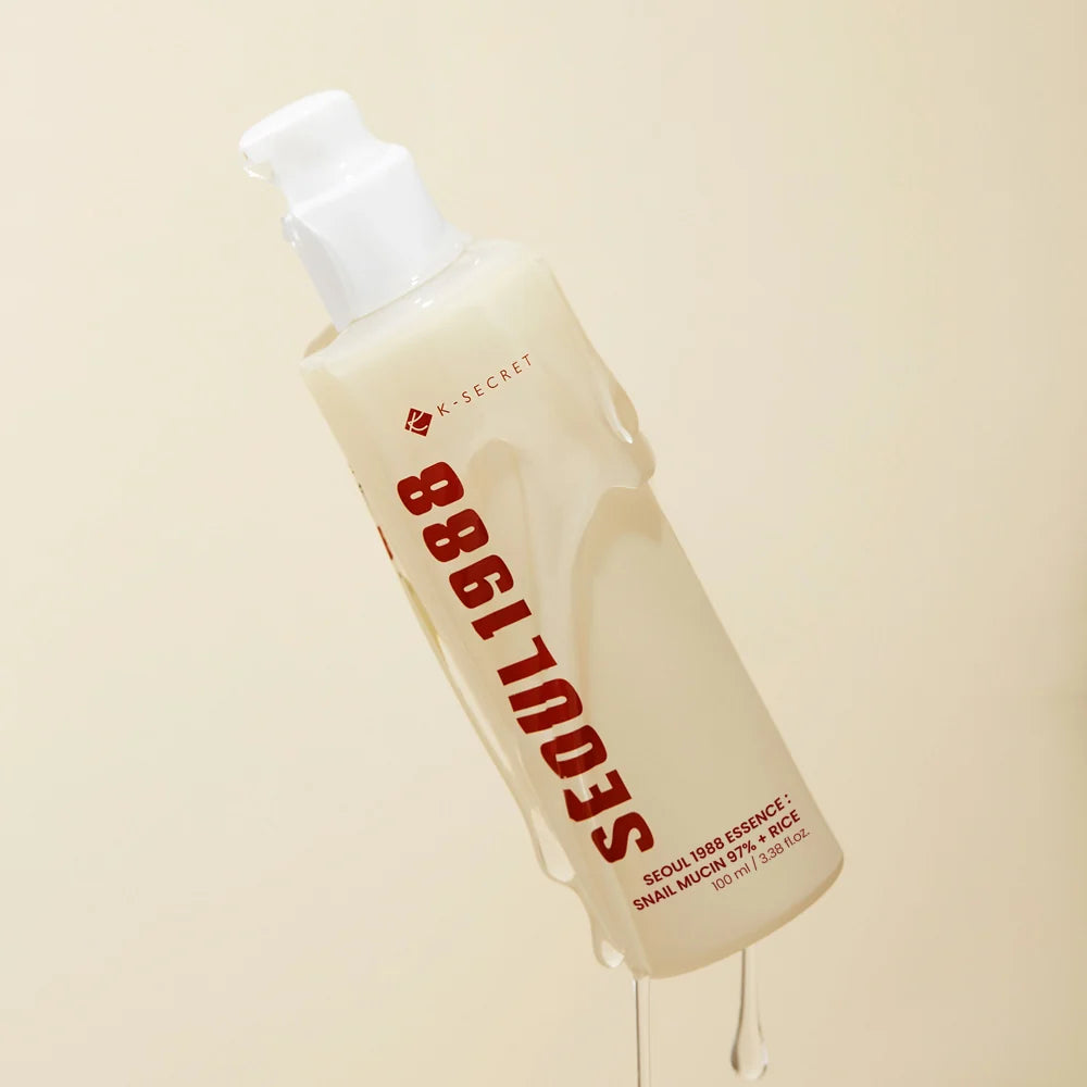 “KSECRET Seoul 1988 Snail Mucin 97% + Rice Essence 100ml bottle on a cream background”