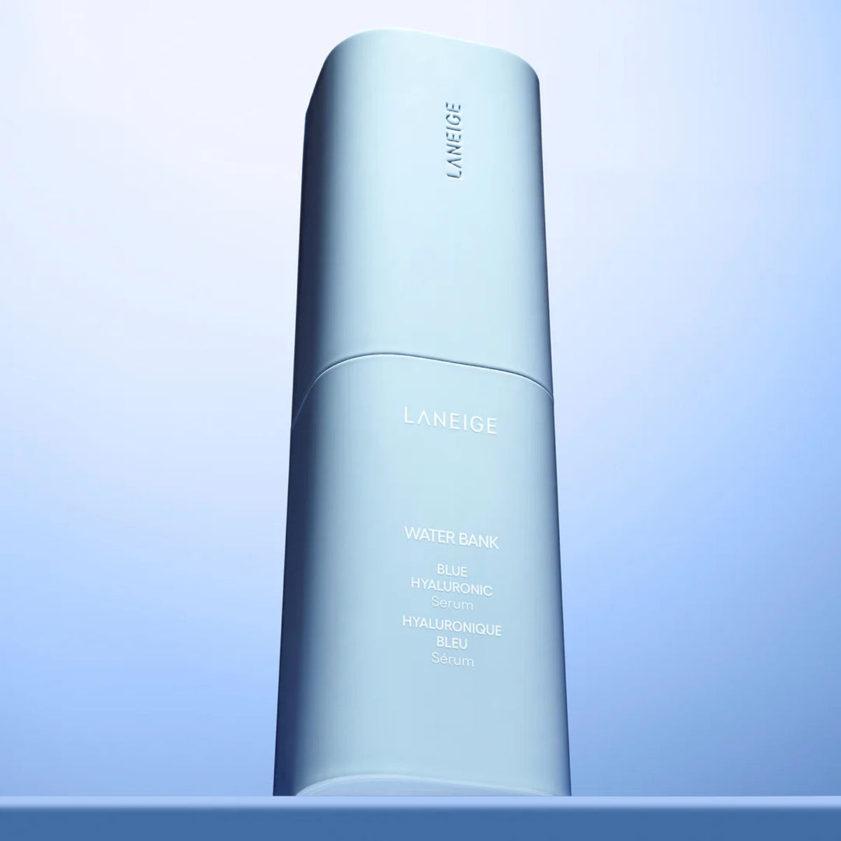 LANEIGE Water Bank Blue Hyaluronic Serum 50ML bottle against a blue background