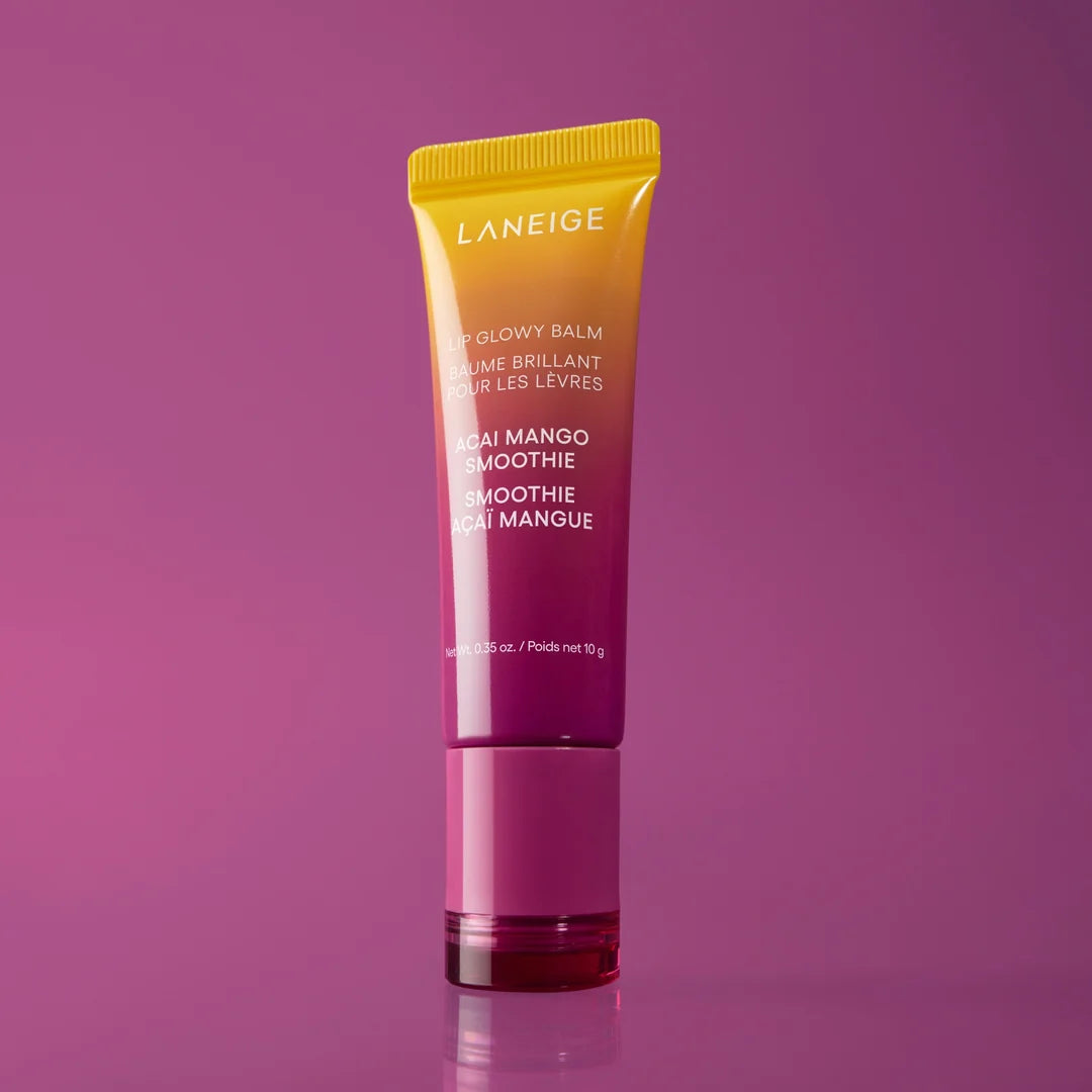 LANEIGE Lip Glowy Balm Acai Mango Smoothie 10g tube with a yellow cap on a purple background.