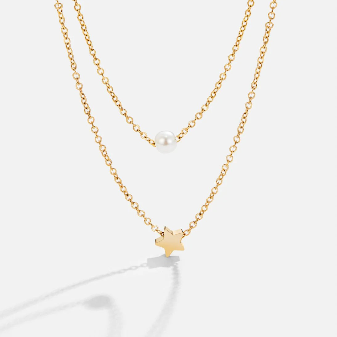 BEAUTIFUL EARTH - LAYERED GOLD STAR & PEARL NECKLACE