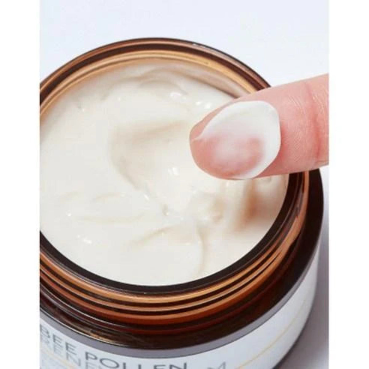 Open MISSHA Bee Pollen Renew Cream jar showing the cream texture